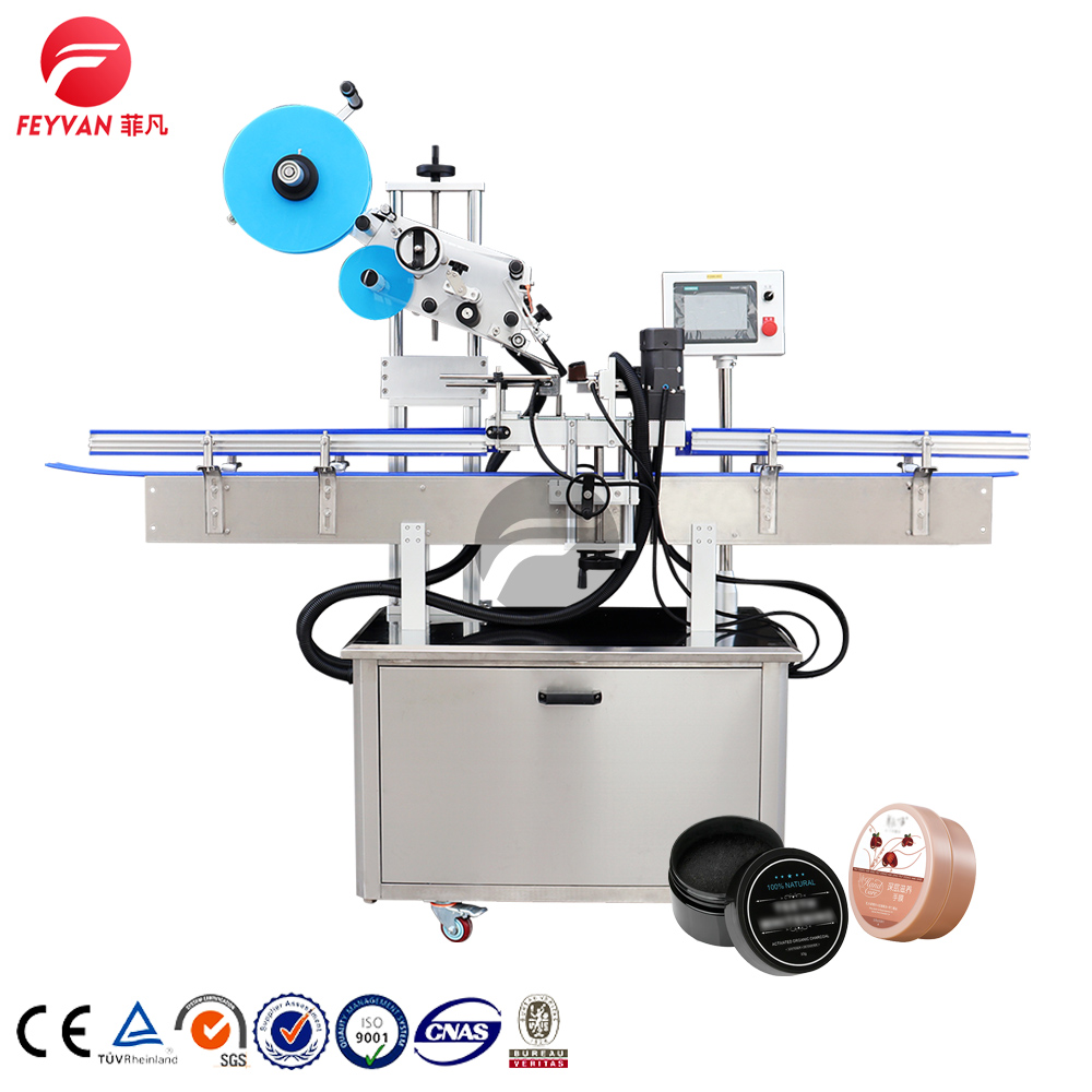 Flat bottle labeling machine